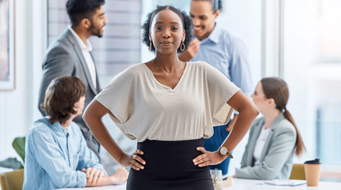 Leadership, motivation and corporate black woman leader in a business meeting with happy team in of.